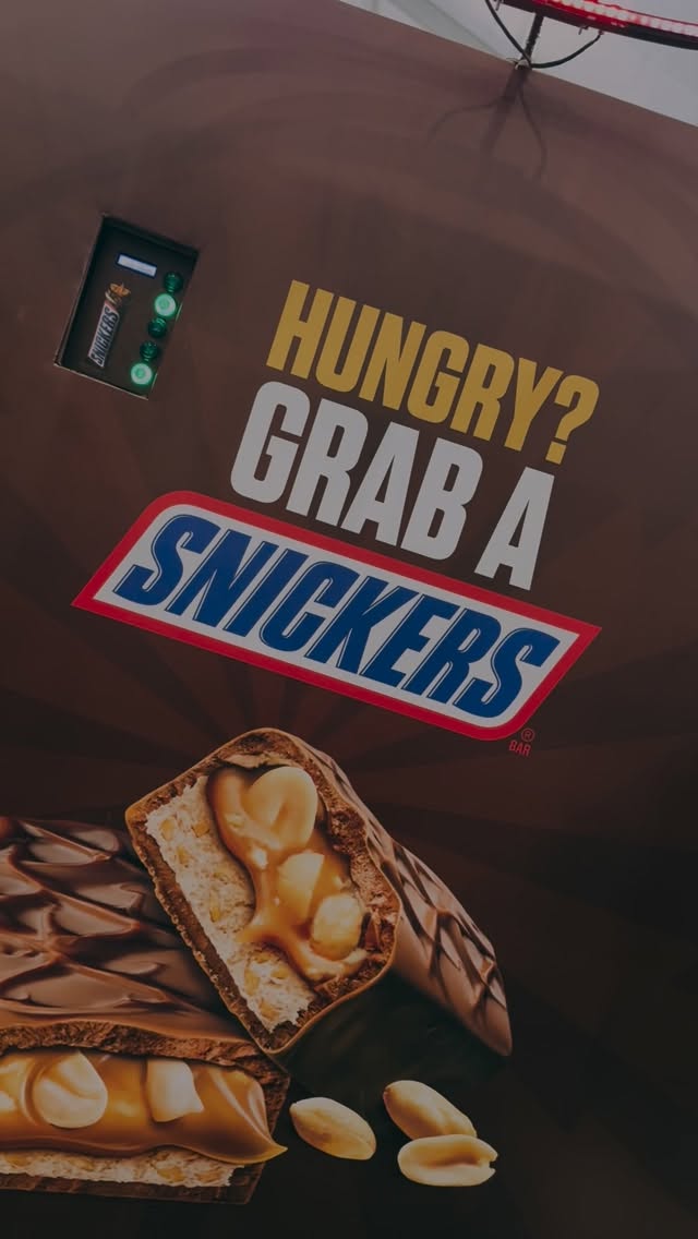 Instagram post by @delhihalfmarathon for Snickers. Caption reads: Grab a Snickers, like for real… 😅

A 🆒 agility....