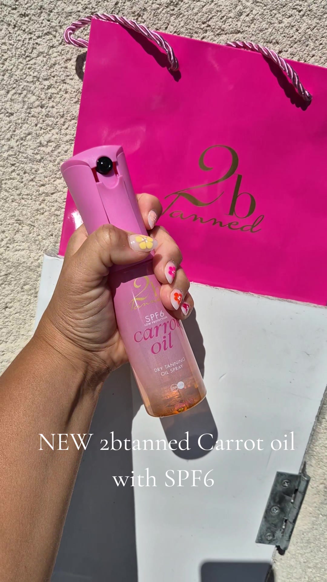 TikTok post by @max_jane25 for 2bTanned. Caption reads: MUST HAVE CARROT OIL THIS SUMMER OR HOILDAY ☀️💗 ....