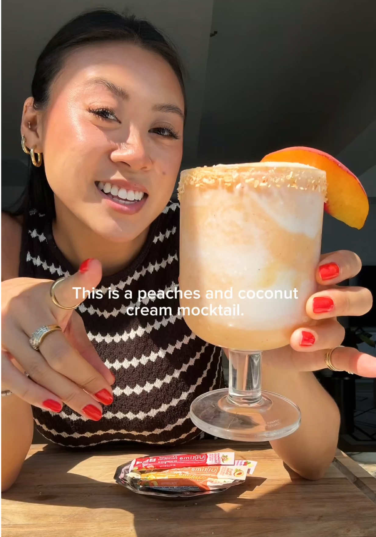 TikTok post by @emeraldcchan for Ultima Replenisher. Caption reads: [...] + coconut cream mocktail made w/ @Ultima....