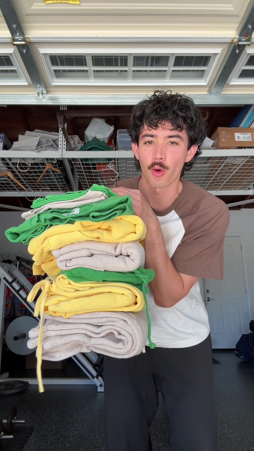 TikTok post by @ipeakedinsecondgrade for Elwood Clothing. Caption reads: New summer colors w @Elwood 💚💛 .