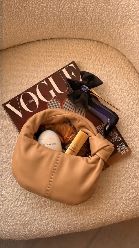 Instagram post by @deapetta for Carolina Herrera. Caption reads: [...] holiday gift for every Good Girl....