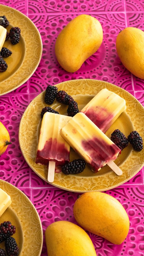 Instagram post by @nibblesnfeasts for Real California Milk. Caption reads: Spring is almost here, and these Yogurt Mango....