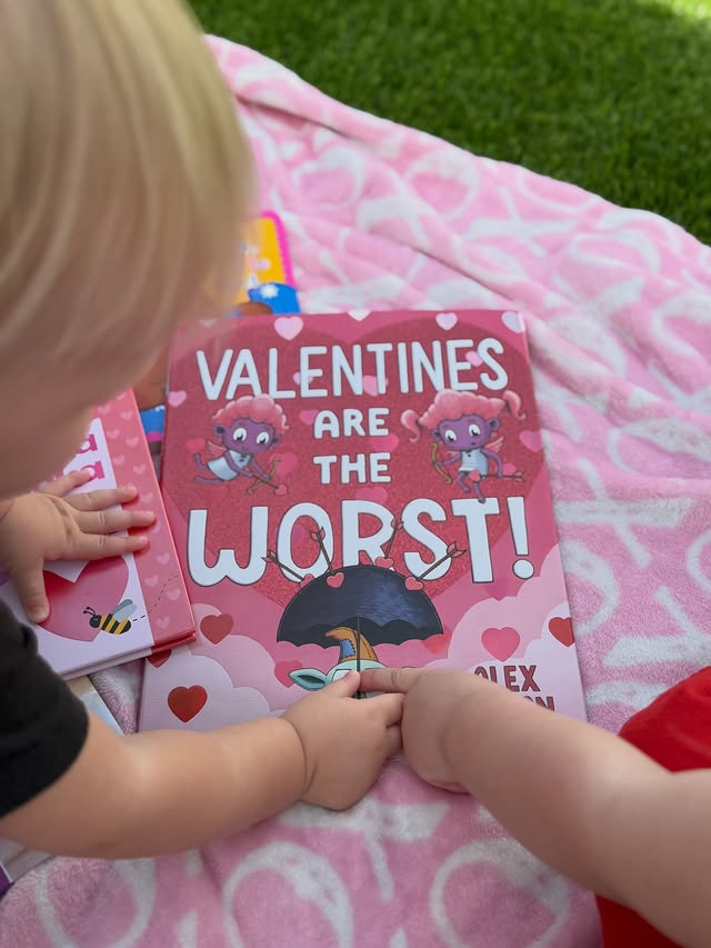 Instagram post by @suethebookie for Simon & Schuster. Caption reads: Happy Valentine’s Day! ❤️🩷♥️💞 Are you doing....