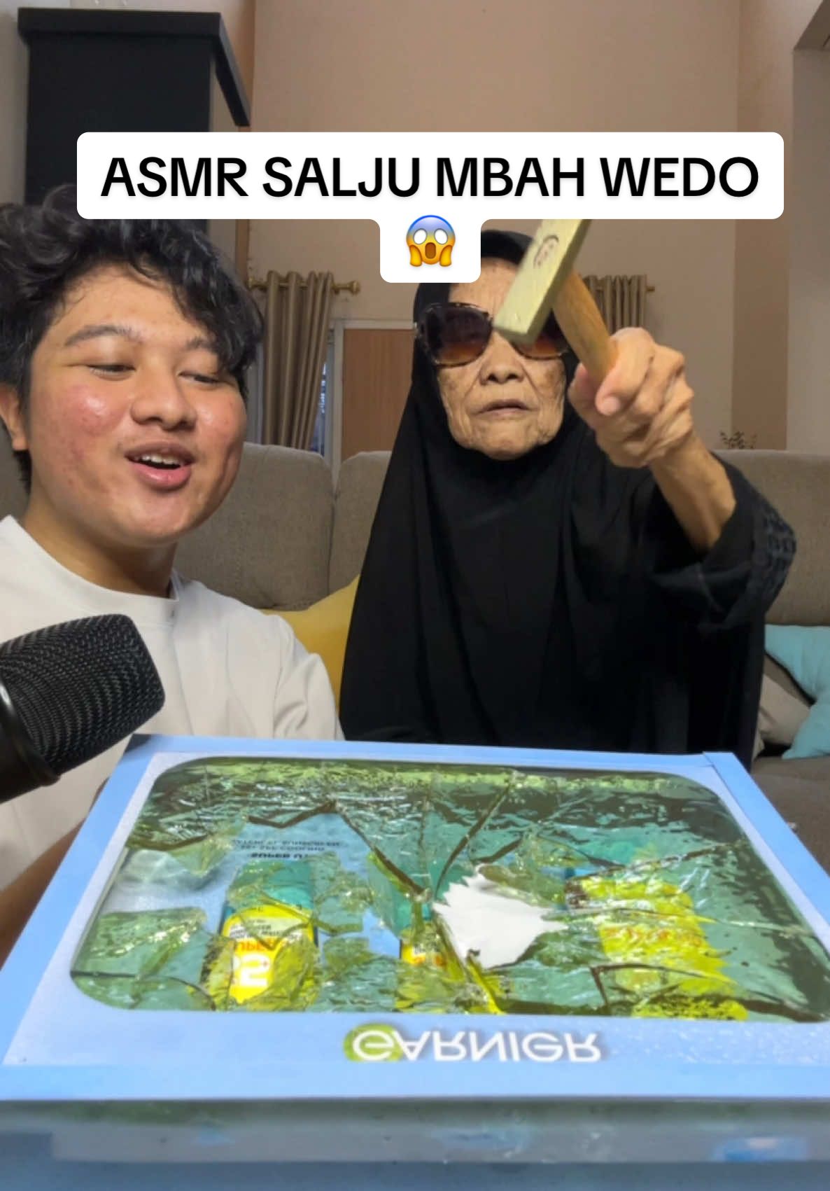TikTok post by @fikranfikrun for Garnier Indonesia. Caption reads: Asmr bareng bidadari vintage, mbah kaget ada es di....