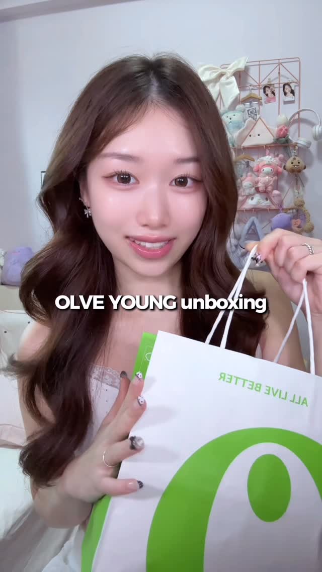 Instagram post by @crysta.bel for OLIVE YOUNG. Caption reads: How do you guys think @oliveyoung_global did with....