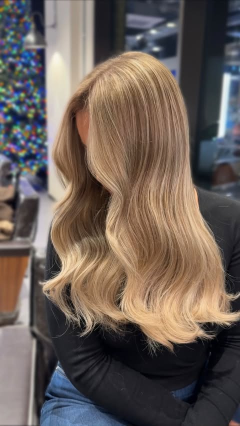 Instagram post by @hair.by.suzi for Moroccanoil Professionals. Caption reads: Butter Bronde 🧈 Filmed for my education platform....