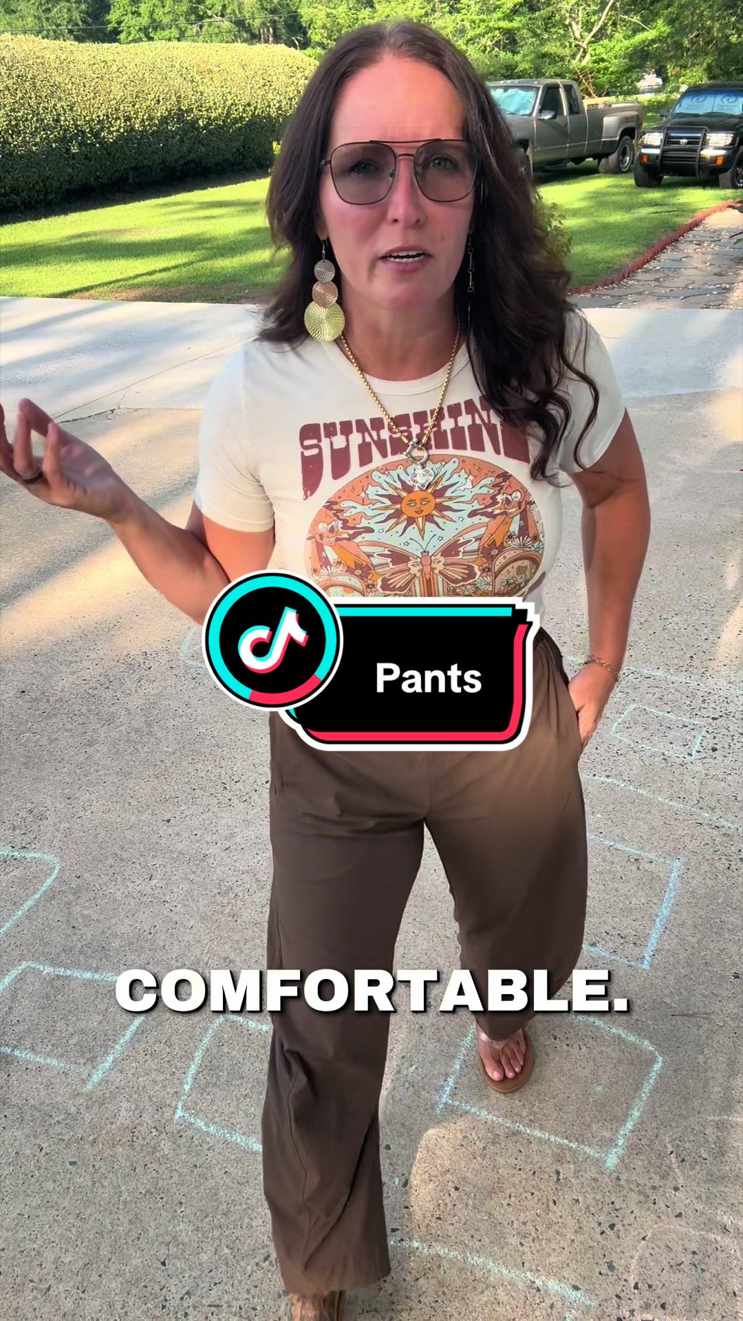 TikTok post by @jennyrowell for Songling Fashion. Caption reads: These barrel travel pants are the definition of....