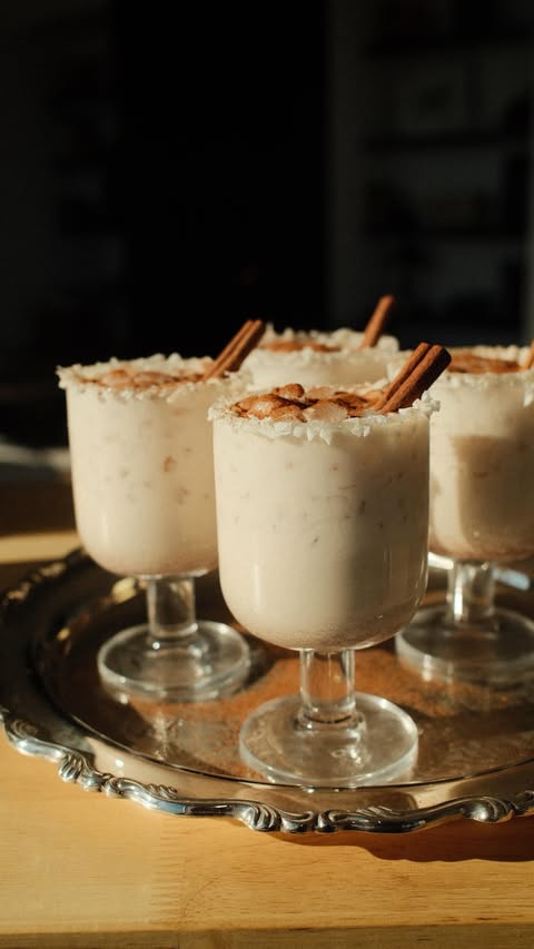 Instagram post by @pilarvarelaa for The Feedfeed. Caption reads: (ad 21+) This Holiday Coquito with....