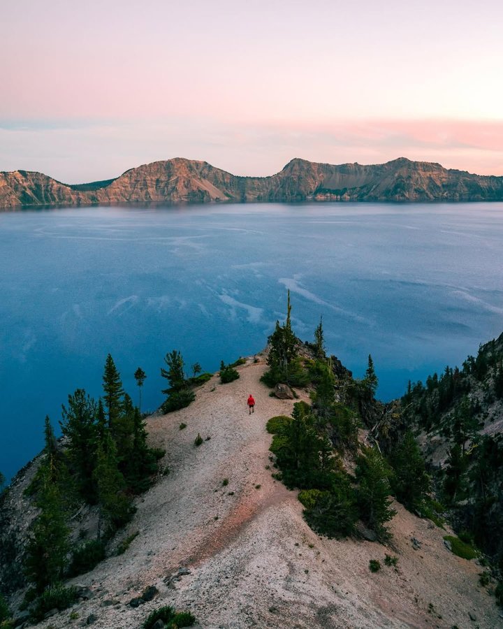 Instagram post by @austinsills for Travel Oregon. Caption reads: 📍 Crater Lake National Park ✔️⁣
⁣
Very stoked to....