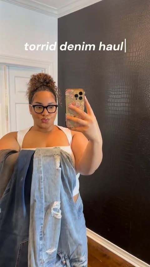Instagram post by @kalanibagsby for Torrid. Caption reads: So obsessed with these! Denim by Torrid never....