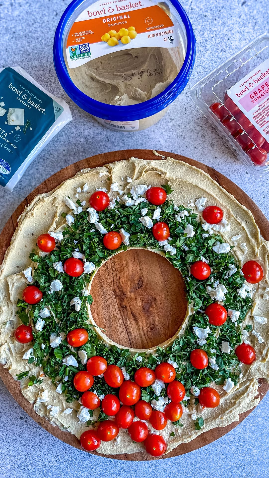 Instagram post by @makefoodlovely for ShopRite. Caption reads: 🎄HUMMUS WREATH 🎄 

By the 8th day of Christmas,....