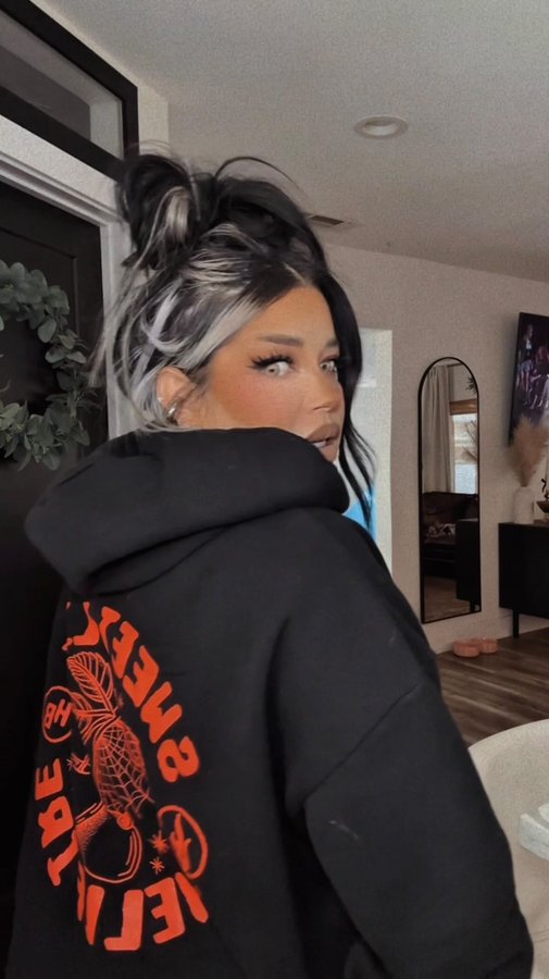 Instagram post by @radxmama_ for Hell Babes. Caption reads: hoodie is @hellbabes ❤️‍🔥 use code: RADXMAMA....