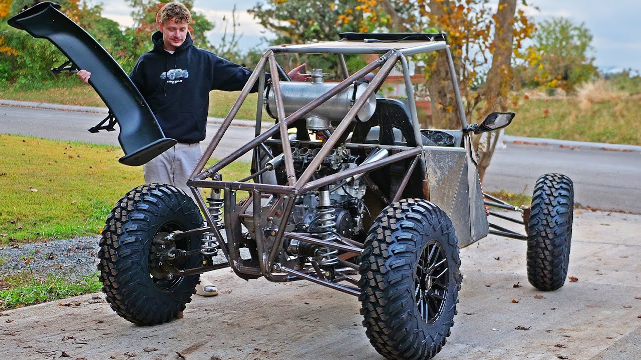 YouTube post by @VasilyBuilds for Benchmark Abrasives. Caption reads: Mini hayabusa powered trophy truck on all 4's.