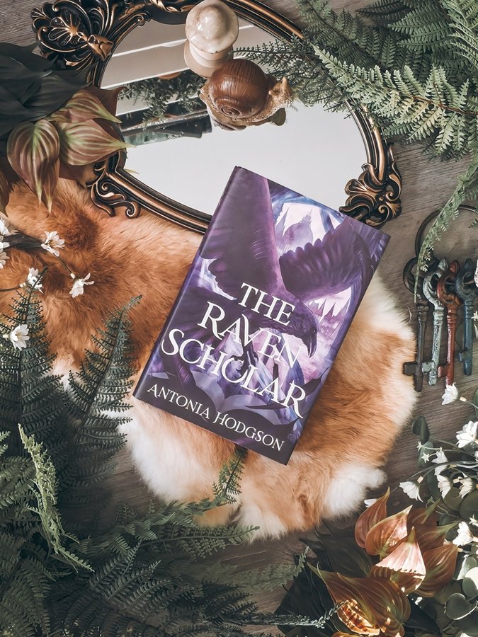 Instagram post by @melting_pages for Illumicrate. Caption reads: Do you have a favorite bookstagram prop?

If....