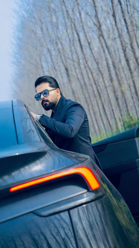 Instagram post by @shubham_ss for Tesla. Caption reads: [...] ⚡️ Finally got behind the wheel of the Tesla....