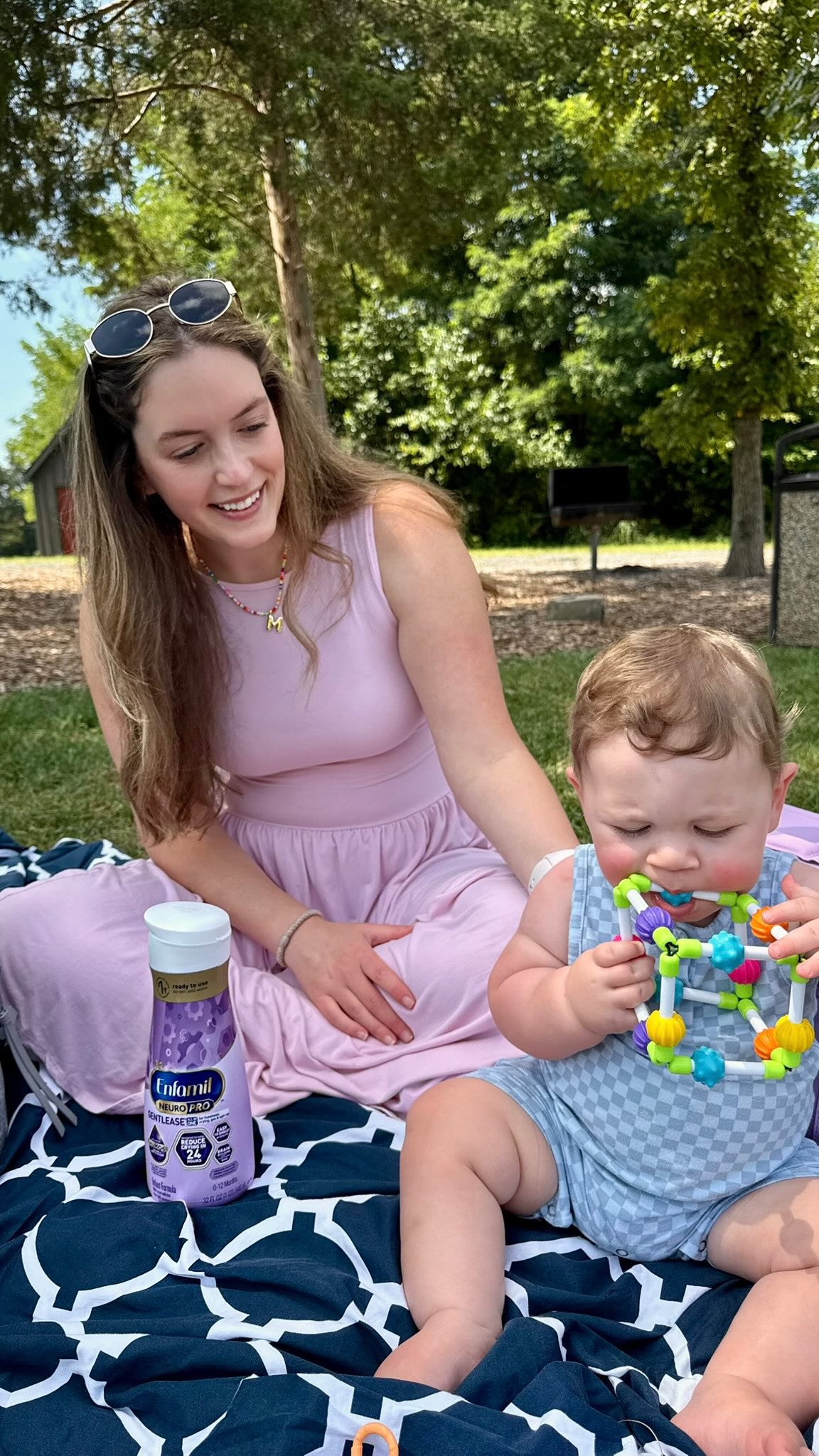 Instagram post by @melissathompsonhome for Enfamil. Caption reads: Spend a summer day with us as a family of four! As....