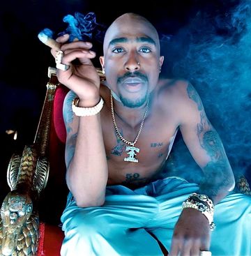 Instagram post by @2pacunlimited for King Ice. Caption reads: What @2pac songs gives you that friday feeling and....