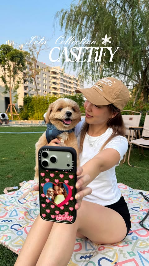 Instagram post by @aprilnaphatrada for CASETiFY. Caption reads: Keeping fu noi closee 🐶☎️ #casetify....
