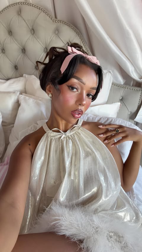 Instagram post by @daphneblunt for MONDAY Haircare. Caption reads: My classic up do ~ but make it festive 🎀✨💝 using....