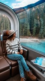 Instagram post by @simply.madeleine for Tourism Calgary. Caption reads: This is your sign to visit Canada during fall....