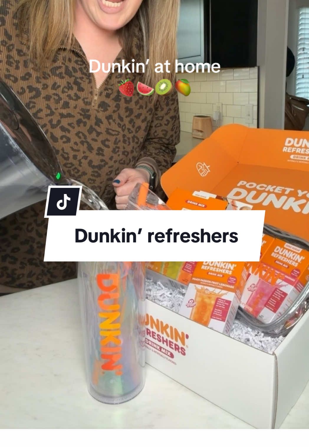 TikTok post by @thedailywith_kaylee for Singles To Go. Caption reads: [...] newly released @Dunkin' refreshers! @Singles....