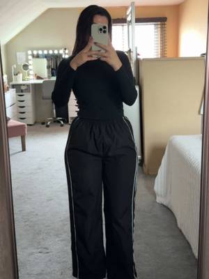 TikTok post by @glowbyasmine for OmmigO. Caption reads: so comfy n cuteee🫶🏼 #blackpants #gympants....