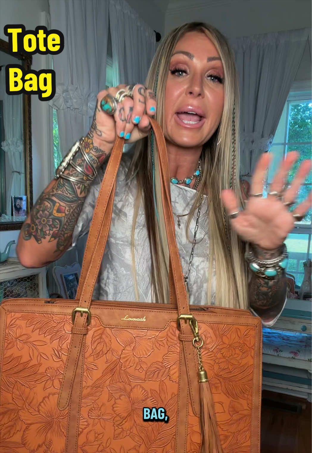 TikTok post by @nattymctatty1981 for Lovevook. Caption reads: [...] #laptopbag #travelbag @Lovevook Bags.