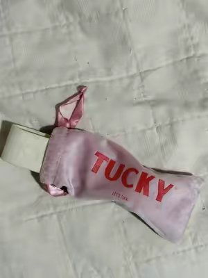 TikTok post by @emgillyy for TUCKY. Caption reads: [...] make an outfit more put together ! @Shop....