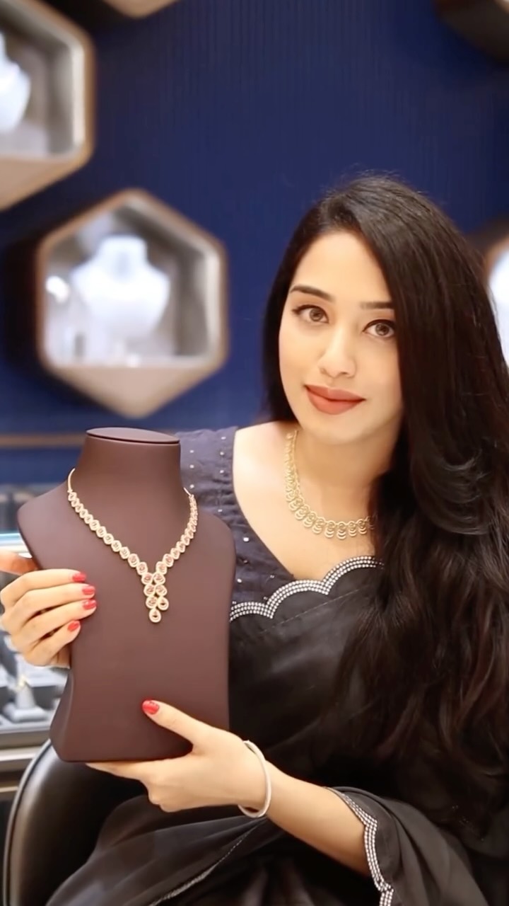 Instagram post by @zainabroshna for Malabar Gold and Diamonds. Caption reads: Diwali Glow hits Different with VYANA of....