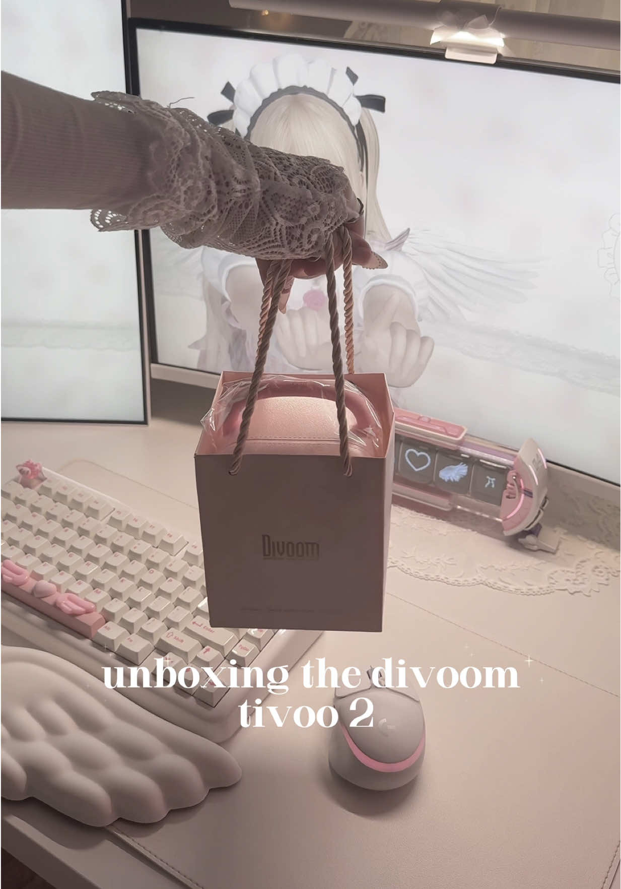 TikTok post by @cqtbree for Divoom. Caption reads: Divoom Tiivoo 2 the most adorable [...].