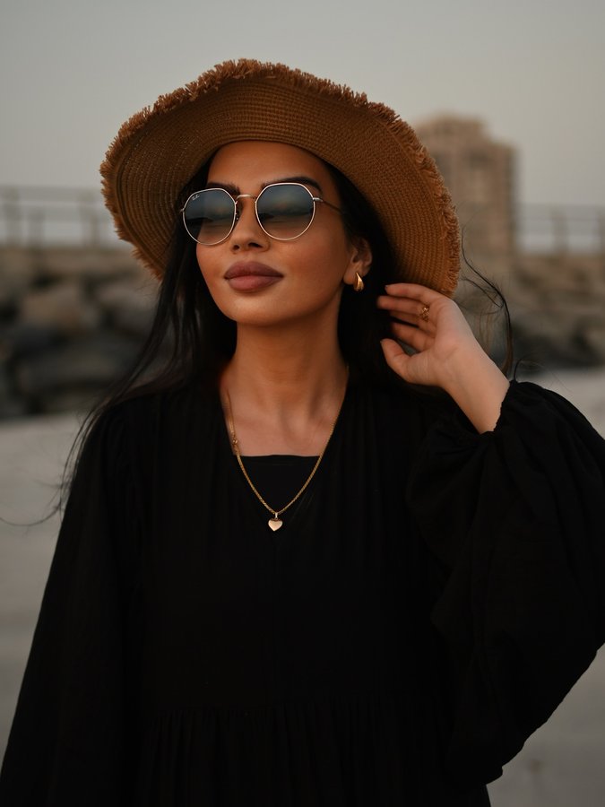 Instagram post by @sura.alhamid for Sunglass Hut. Caption reads: ♥️ @sunglasshut
 #OwnYourMoment #SunglassHut....