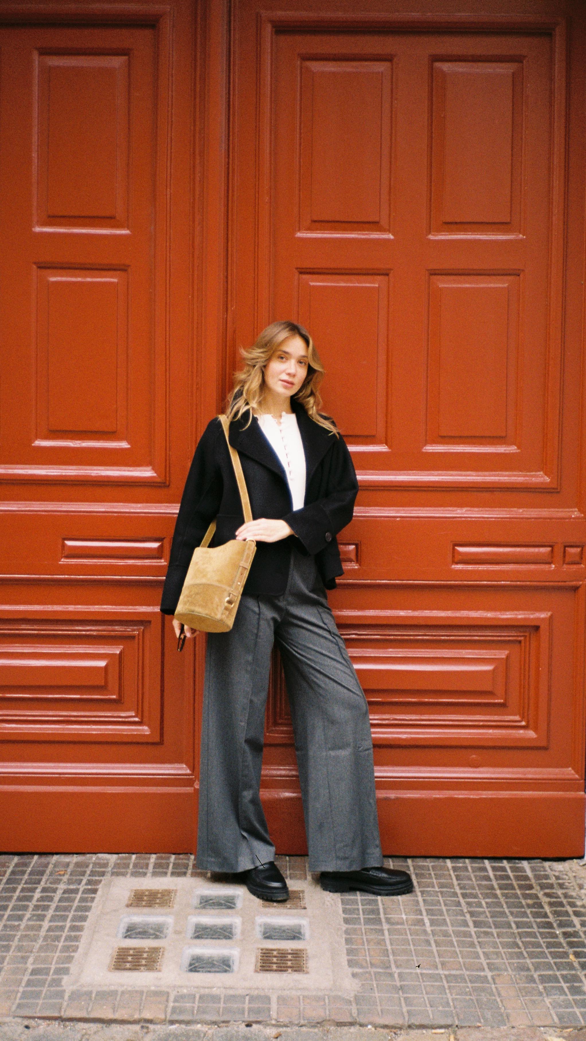 Instagram post by an influencer for Sézane. Caption reads: Berlin autumn in my favorite colors 🍁 @sezane....