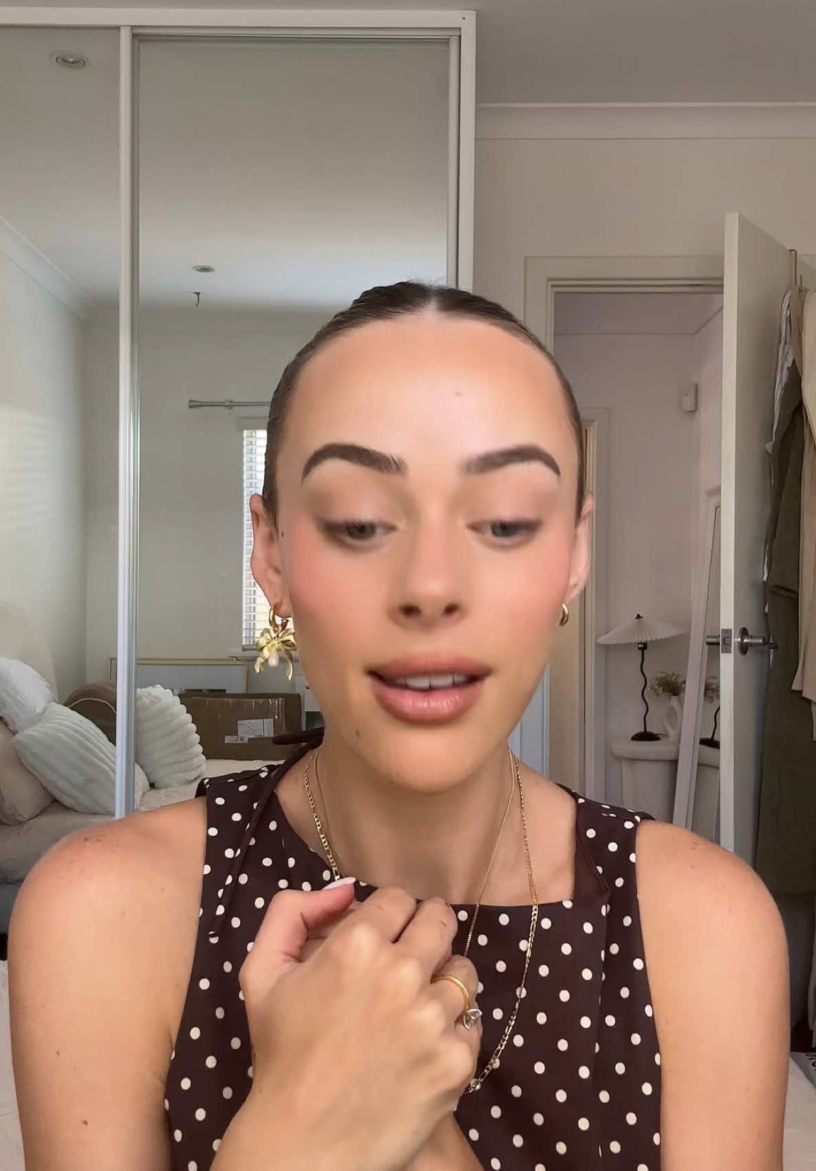 TikTok post by @emdavies___ for MCoBeauty. Caption reads: [...] WEDDING BELLS 💍💒  @MCoBeauty ad #2025bride....