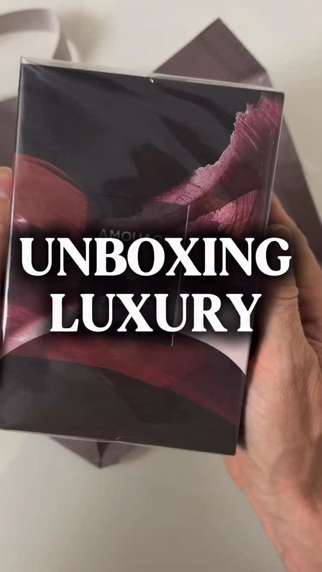 Instagram post by @fragmental.uk for AMOUAGE. Caption reads: LUXURY FRAGRANCE UNBOXING - AMOUAGE SEQUENCE....