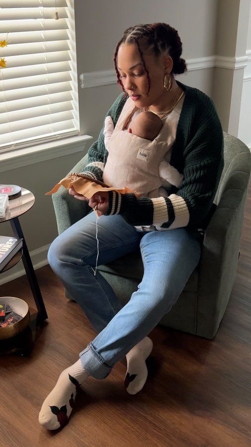 Instagram post by @stacysinterlude for Baby Tula. Caption reads: Black history is a lifelong lesson in my house.....