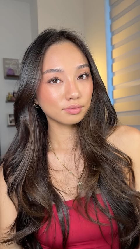 Instagram post by @raxhellam for Nude by Nature. Caption reads: [...] I call a summer glowy makeup 🍒☀️....
