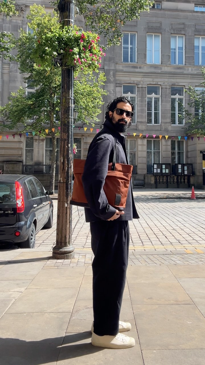 Instagram post by @tomcheema for Antler. Caption reads: Sunday morning in navy and black before heading up....