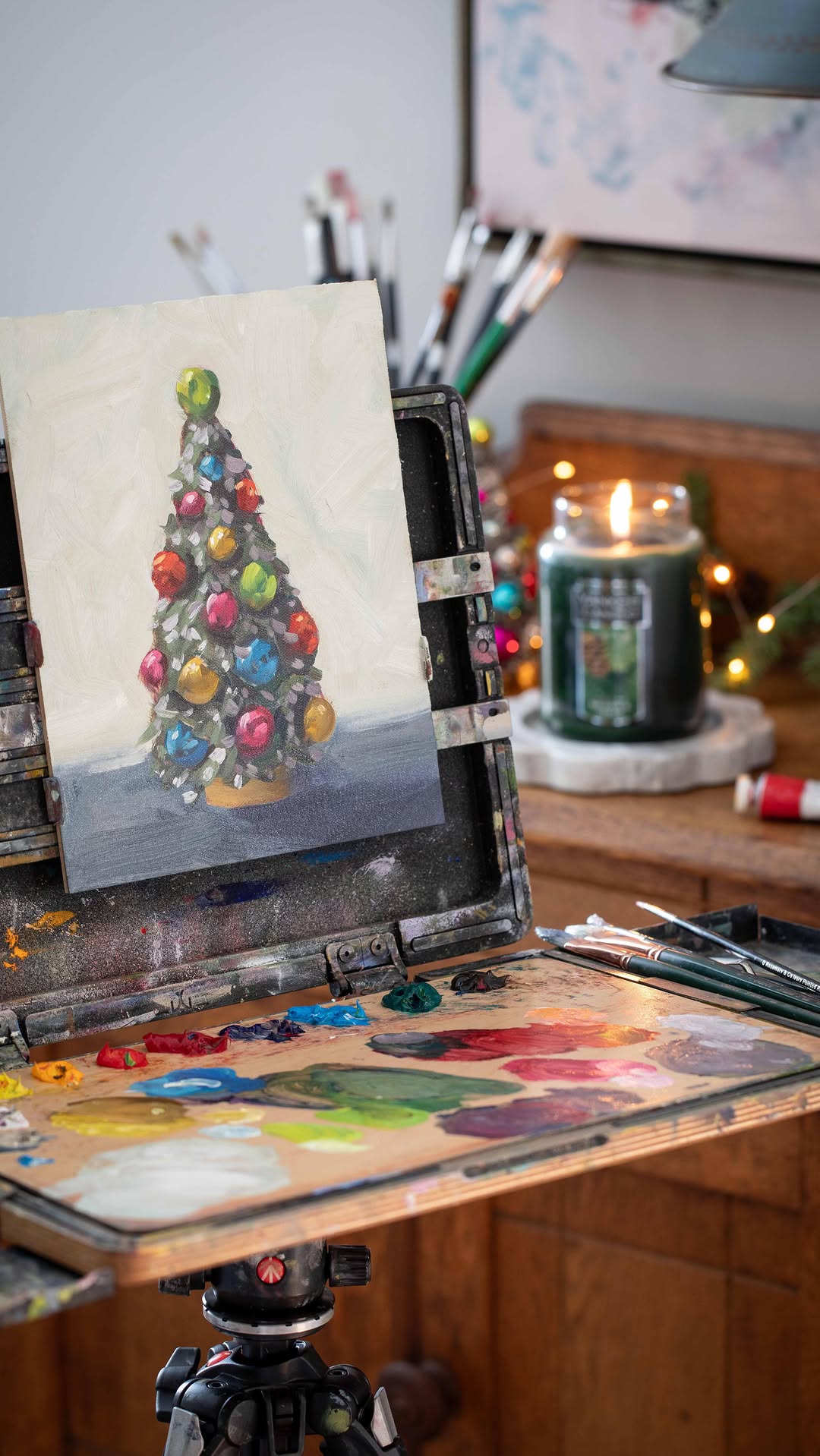 Instagram post by @inspiredbycharm for Yankee Candle. Caption reads: Setting the perfect mood for a painting session....
