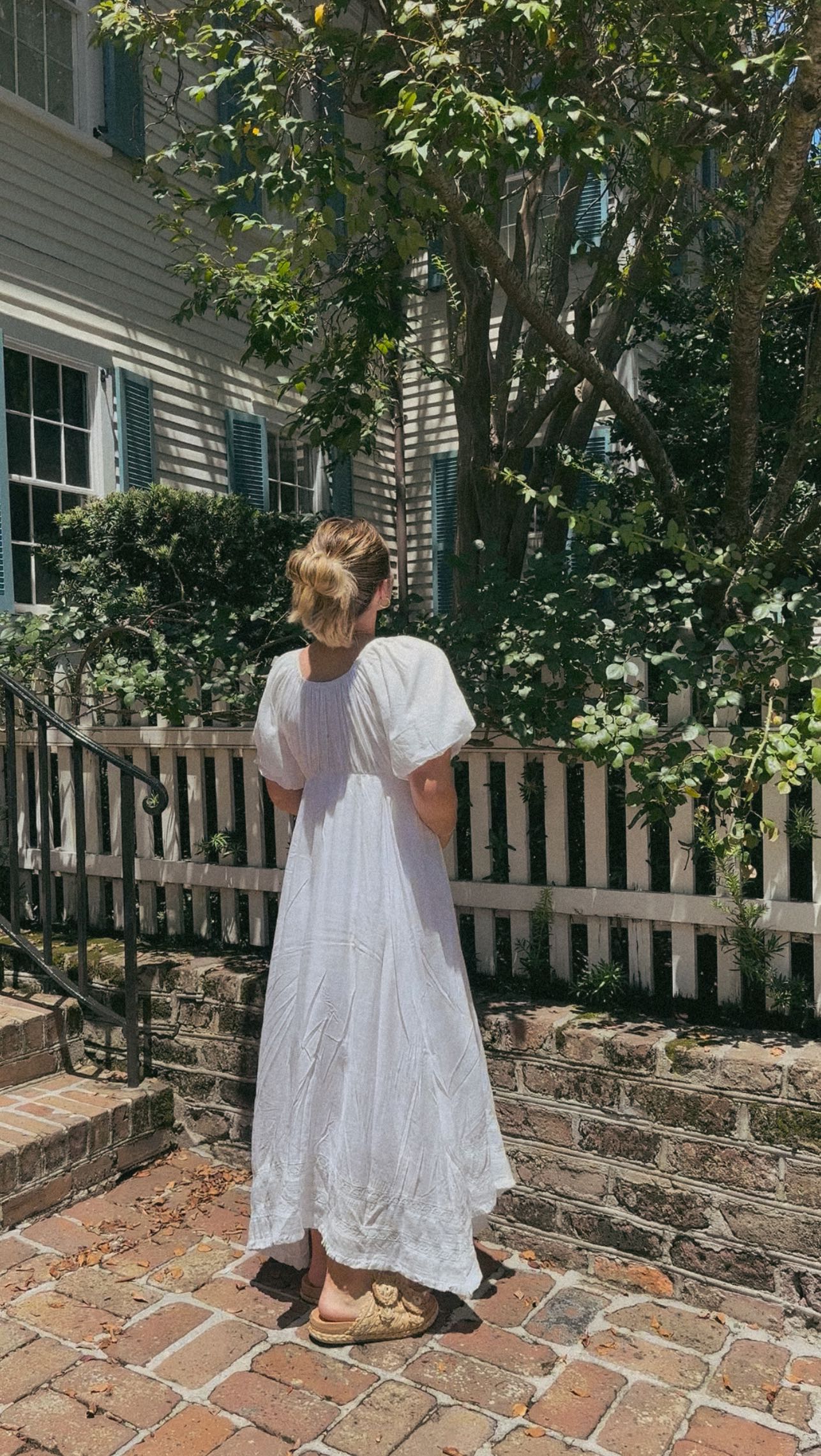 Instagram post by @lucythiewes for Called to Surf. Caption reads: [...] white dress in the summer 🤍
•
Shop Called....