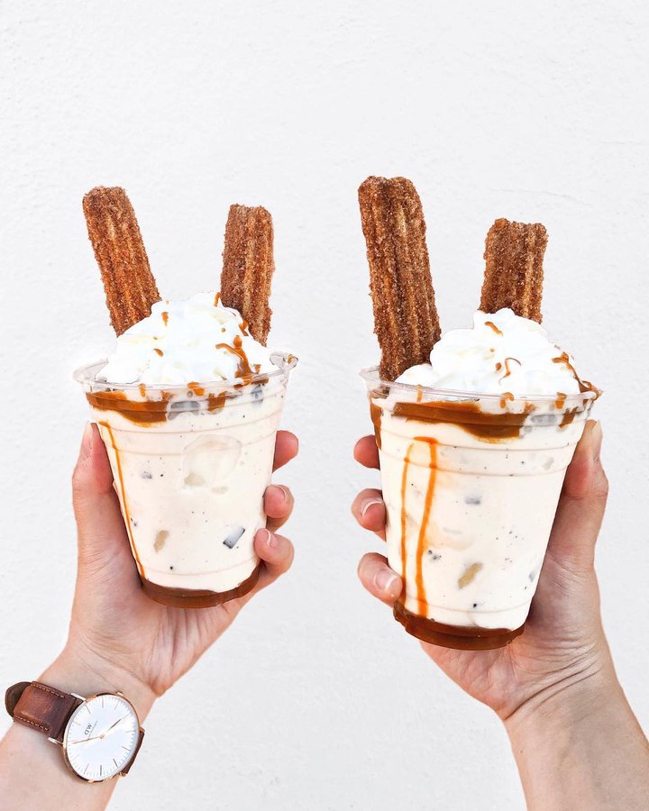 Instagram post by @feedmeimei for Eater LA. Caption reads: Ate my way through all the churros in Disneyland....