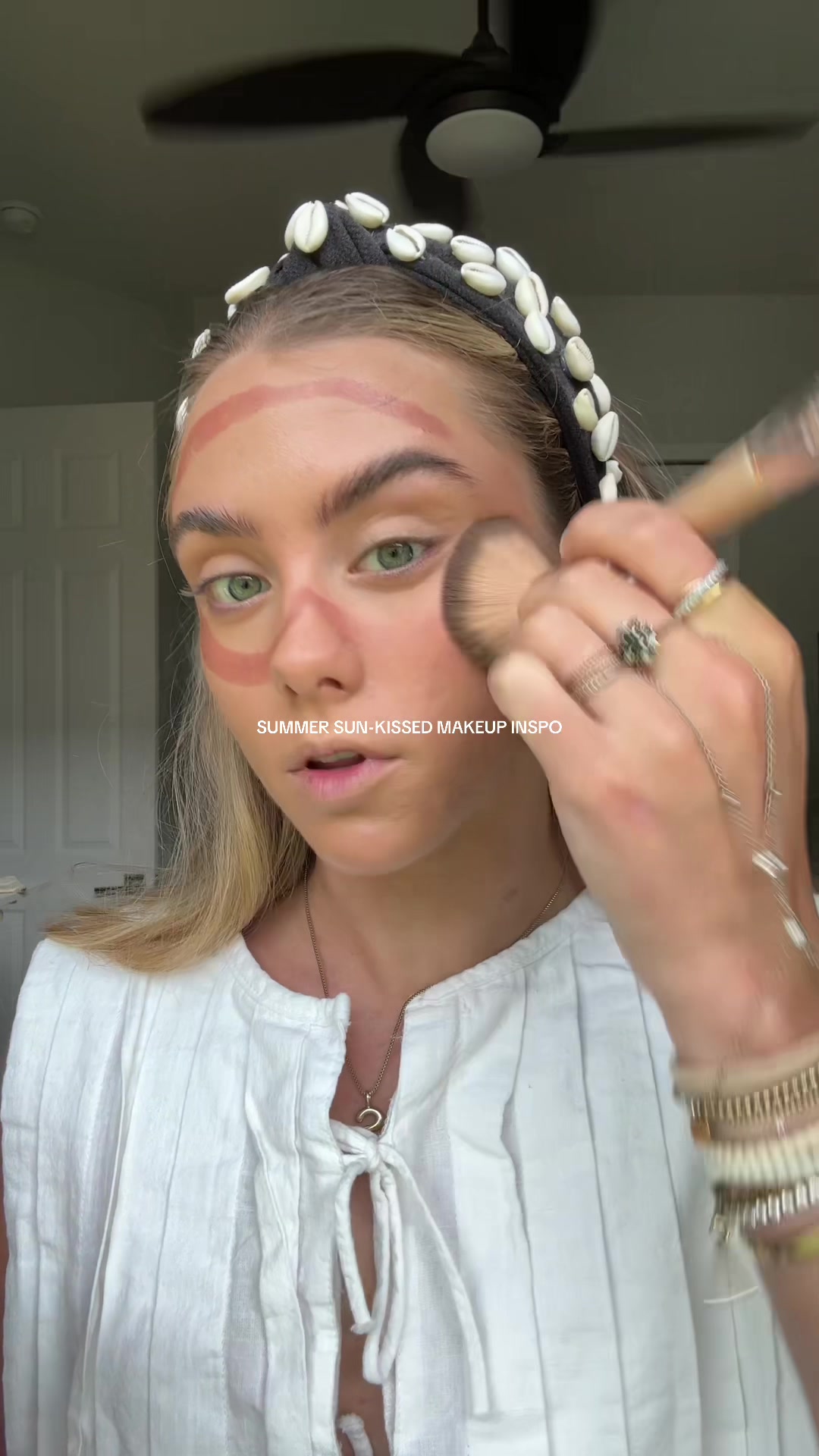TikTok post by @sloanevosen for Haus Labs. Caption reads: [...] ✨ this is glossy cinnamon!!! #hauslabs....