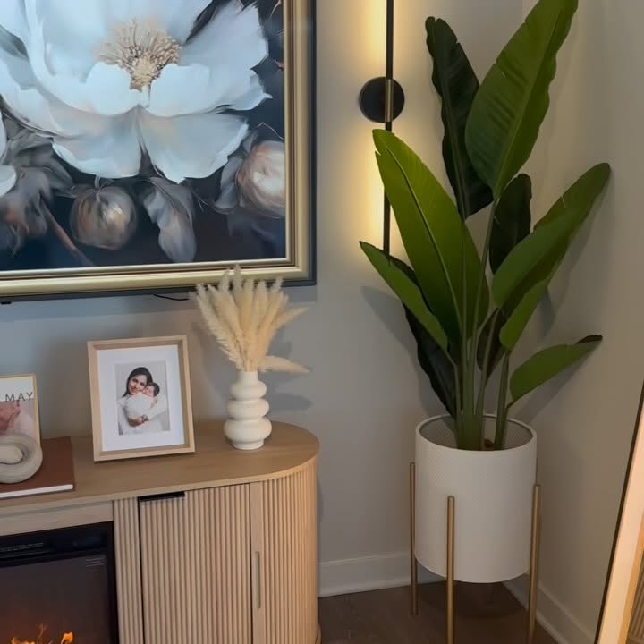 Instagram post by @nycmomjia for Artifact Uprising. Caption reads: Just in time for Mother’s Day—our living room got....