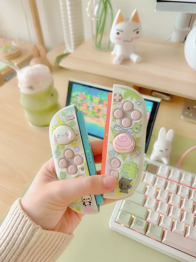 Instagram post by @mirumys for Geekshare. Caption reads: [...] 😭 switch case and thumb grips from....