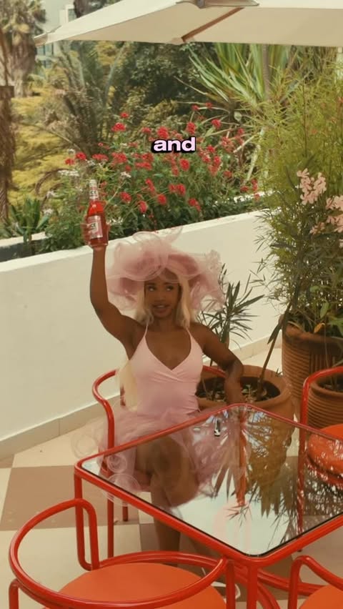 Instagram post by @teminasemo for Smirnoff. Caption reads: [...] what you’re cheersing to, get a cold....