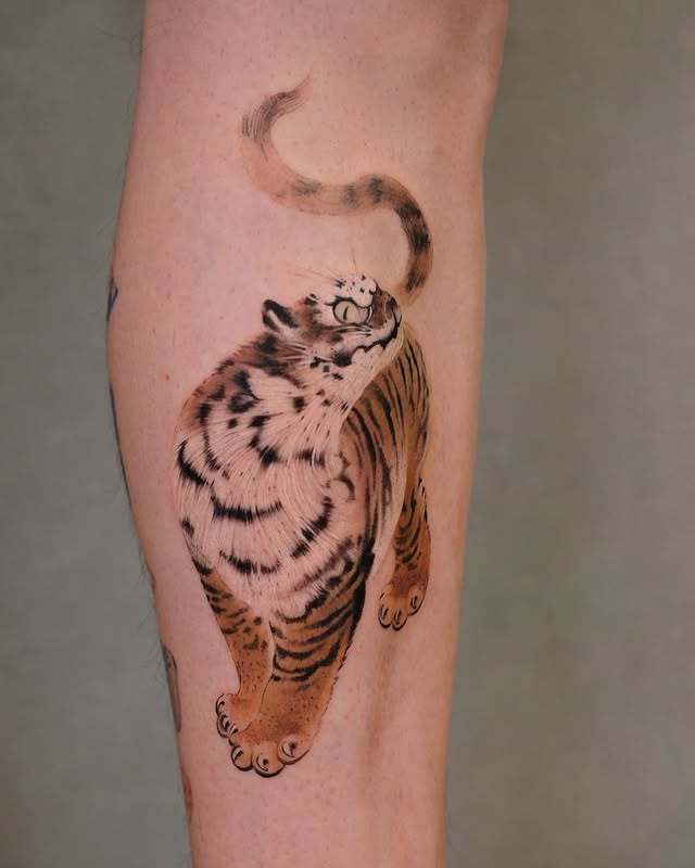 Instagram post by @chenjie.newtattoo for Pepax Official. Caption reads: There's a tiger asleep in every heart. When it....