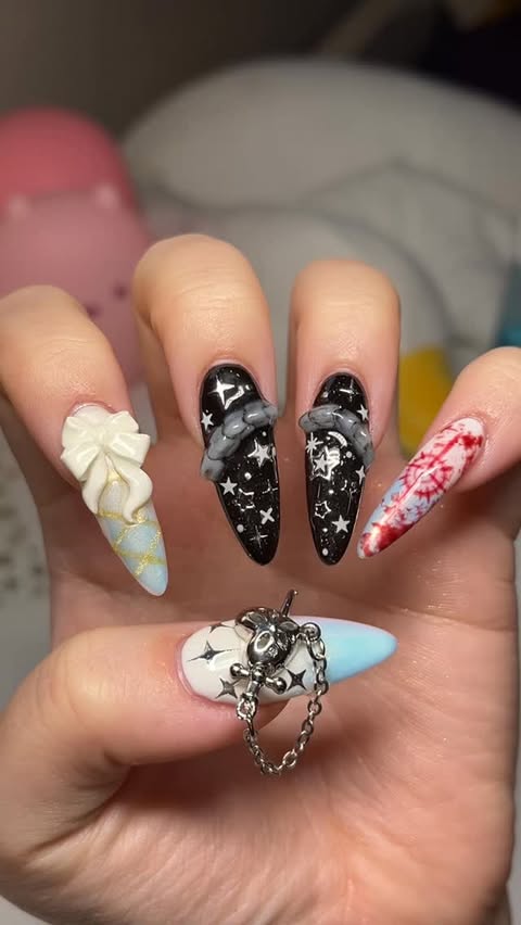 Instagram post by @momomofumochi for Modelones. Caption reads: ALNST nails 🎙️💫⛓️‍💥

I've been dreaming of....