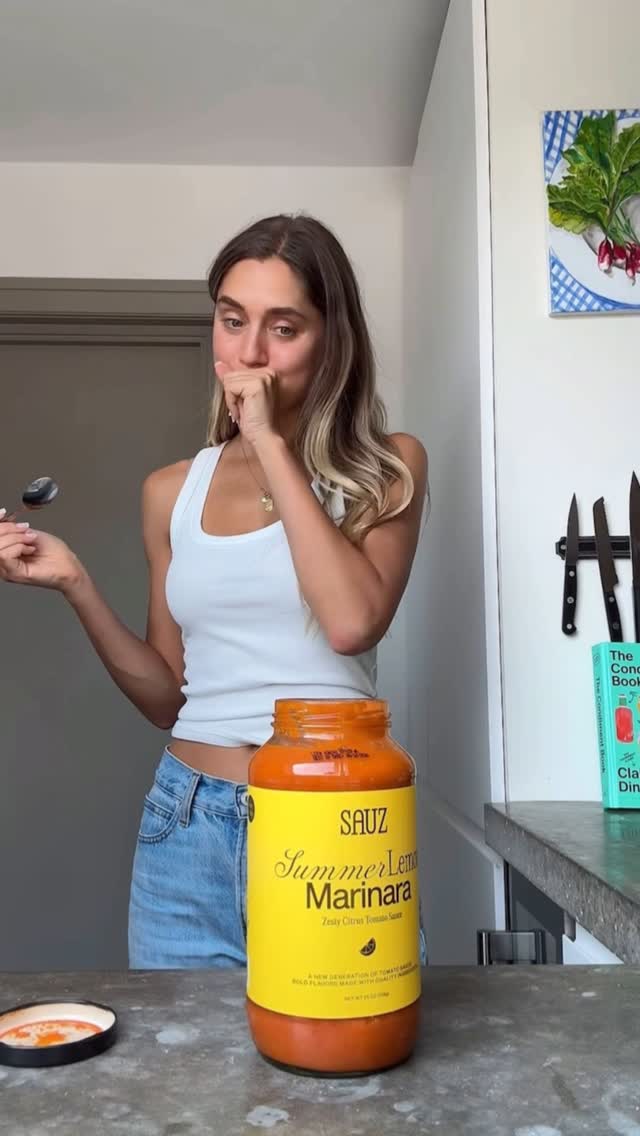 Instagram post by @condimentclaire for SAUZ. Caption reads: Finally got my hands on @getsauz 🤩🥫🍋 If the....