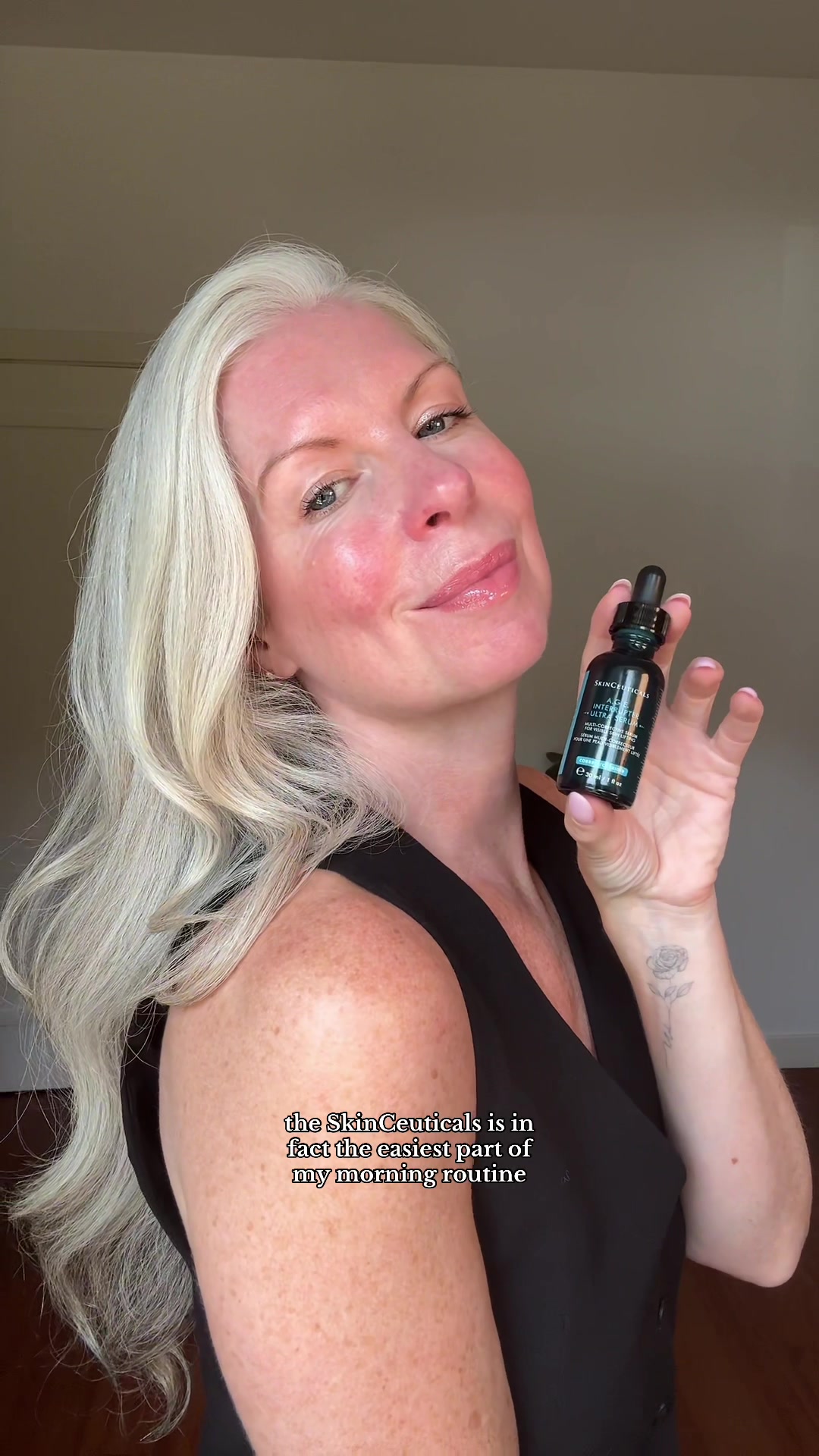 TikTok post by @goodlifecarrie for SkinCeuticals. Caption reads: AD| My morning lifting and tightening routine with....