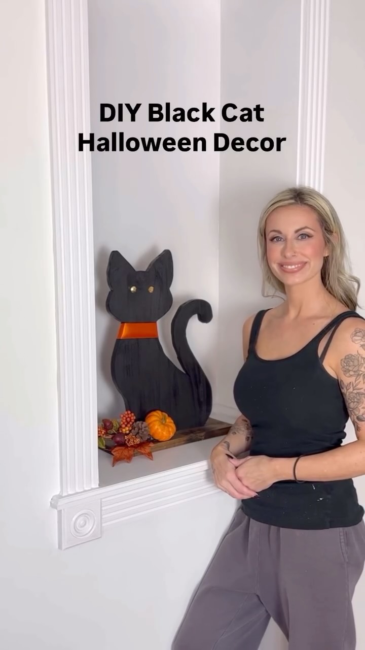 Instagram post by @erinspainblog for Kreg Tool. Caption reads: I made this DIY black cat Halloween decor using my....
