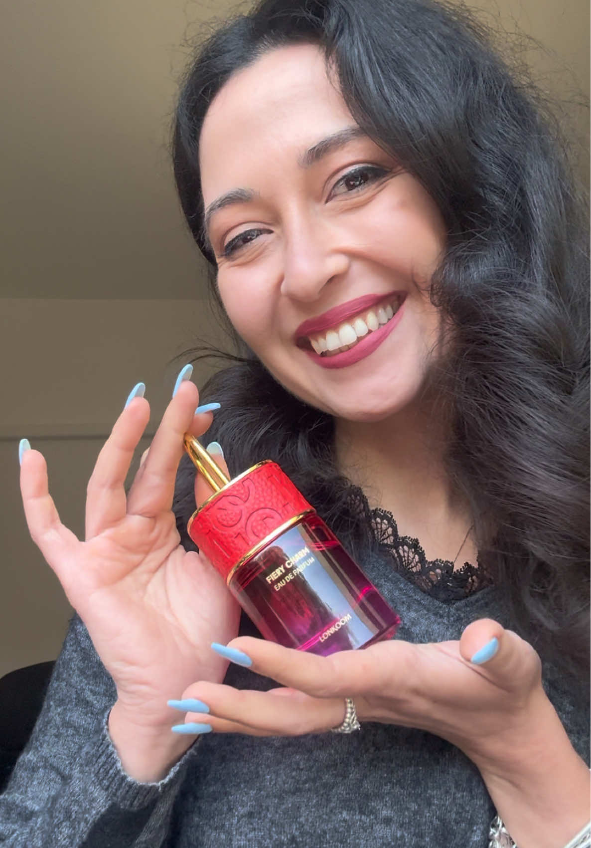 TikTok post by @annalauraspinosa for LONKOOM.ES. Caption reads: [...] #fruitpassion #gifted #perfume @LONKOOM.ES.